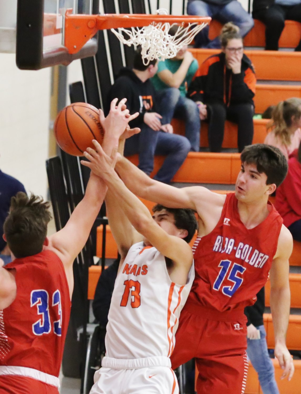 Panthers Tim Mitchell (right) and Boedy Baker team up to deny a fast break lay-in attempt in action against Grand Saline.